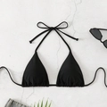 Classic black halter bikini top with adjustable drawstring details on a textured surface - Black