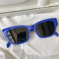 Stylish bright blue cat-eye polygon sunglasses with dark lenses on a white backdrop - Candy Square Royal Blue Resin