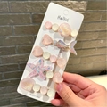 Set de 5 pinzas para el pelo de tema marino con conchas rosas y estrellas de mar - Macaron Rosa (Con Cartón)