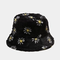 Detailed view of the soft faux fur texture and daisy embroidery on this black bucket hat - Black with White Daisy (5#)