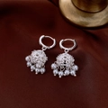 Detail view of silver Jhumka hollow bell earrings with hanging white pearls on velvet - Silver (Bell Pearl Style)