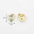 Detail view of gold alloy heart pendant with crystal inlay showing 23x15mm dimensions - Heart