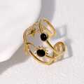 Minimalist adjustable gold open ring with celestial sun moon star motifs and black accents - Gold Black Inlay
