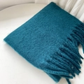 Teal solid cashmere-like knit scarf with fringe tassels on a minimalist background - Dark Green