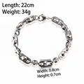 Men's silver stainless steel chunky chain bracelet with 22cm length and flat rivet design - Bracelet / Silver