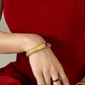 Golden tubogas bracelet for women with rectangular red zircon inlay and spiral texture - 12mm / Red