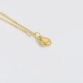 Minimalist gold necklace featuring a detailed oval textured money bag pendant for women - Shell