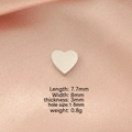 Polished heart charm measurements: 7.7x8mm with 1.8mm hole on pink satin fabric - 8*8mm Heart-Shaped Bead with Small Hole / Steel