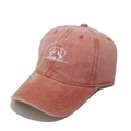 Close-up of peach-pink washed cotton baseball cap with detailed white puppy embroidery - M (56-58cm) / Orange