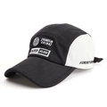 Detailed view of 5-panel baseball cap with letter embroidery and contrast stitching - Adjustable / Black & White