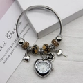 Detail of silver beaded bracelet with heart watch pendant and rose flower charms - Orange