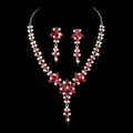 Elegante set di gioielli da sposa con cristalli rossi e design floreale in metallo dorato - Strass Rosso Placcato Oro
