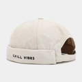 Detail of beige cotton canvas docker hat featuring black CHILL VIBES letter embroidery - Adjustable / Beige