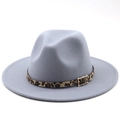 Detailed close-up of light grey wool fedora hat with leopard print band and gold buckle - M (56-58cm) / Light Gray