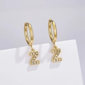 Golden letter Z earring with sparkling white zircons on a minimal white stand - Letter Z (Style: 0229)