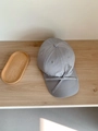 Detail of light gray quick-dry baseball cap with a fabric bow decoration and vent holes - One Size Adjustable (56-58cm) / Gray