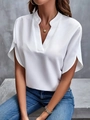 Detail shot of the V-neckline and smooth satin fabric on the white casual summer shirt - S / Tops / White