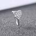Macro detail of silver heart nose clip featuring white pearls and clear diamonds - Heart Pearl (SE1475)