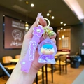 Detail of purple Sakura themed keychain with blue hair cartoon character and silicone strap - Sakura Rope Luminous Bubble Beads Strawberry Figure Style / Purple