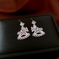 Detailed close-up of silver hollow rocking horse earrings with sparkling cubic zirconia - 37# Silver Earring Post - Silver - Trojan Horse Zircon Hollow
