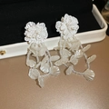 Detailed close-up of white floral tassel earrings with beaded texture and petals - 25# White Flower Shell Tassel (925 Sterling Silver Earring Post)