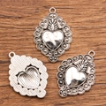 Vintage heart shaped metal charms with intricate floral engraving for jewelry making - 27B3-3 Carved Retro Heart