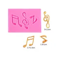Moule en silicone rose avec notes de musique et clé de sol pour fondant ou chocolat - #1 - Rose