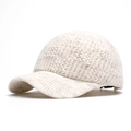 Winter knit baseball cap for women in creamy white thick yarn with a stylish visor - Adjustable / Beige