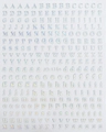 Macro view of holographic 3D laser letter nail art stickers showing full A-Z alphabet - Silver