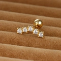 Macro view of gold stainless steel stud earring with five curved zircon stones and ball screw back - 0.8mm / Gold