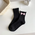 Black JK style ribbed socks with white ruffled trim and a pink bow decoration - Black Base Pink Bow