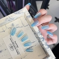 Detail of long coffin cat eye press-on nails with blue-grey gradient and micro-shimmer - By1608's Jade-like Fingers Are As Delicate As Scallions / Glue Type