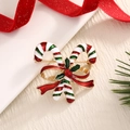 Christmas candy cane brooch with red bow and green holly on a gold alloy base - BR0048-Bow Candy Cane