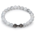 Macro shot of white marble beads and a metal dumbbell bead engraved with LIVE and LIFT - Howlite Black