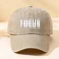 Detailed close-up of FOCUS printed washed cotton baseball cap with vintage finish - One Size / Khaki