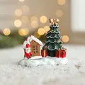 Miniature resin Christmas cabin with Santa and snowy tree figurine, 6.2x6.5cm - Xmas Tree and Cabin