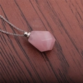 Polished silver chain necklace with a faceted pink stone perfume bottle pendant on wood - Rose Quartz Perfume Bottle (Silver Chain)
