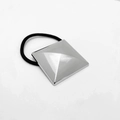 Detail of minimalist black hair tie with silver square pyramid alloy decoration - 3D Pyramid Square / Silver