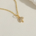 Macro shot of gold paperclip chain necklace with a crystal mushroom pendant detail - Mushroom Design-14K Gold (XL2573-1)