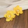 Macro detail of yellow fabric flower earrings with center pearl on wooden background - Yellow-Crystal Flower (925 Sterling Silver Earring Post)