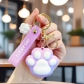 Porte-clés patte de chat violet et blanc avec lanière Lucky Day et métal doré - Patte de Chat Violette