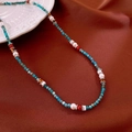 Detail of beaded aquamarine necklace with white pearls on a red silk background - 27# Necklace - Silver Blue Vintage Bead