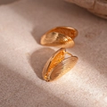 Golden seashell hoop earrings with ribbed texture and ocean style for women's vacation - Gold Embossed Striped Sea Shell Hoop Earrings
