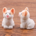 Flocked resin Corgi dog pendant in white and orange colors with metal loop charm - Corgi