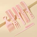 Detailoverzicht van 6-delige roze professionele haarkamset voor styling en ontwarren - Roze