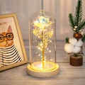 Iridescent gold foil rose in a clear glass dome with LED lights on a wooden base - Wood Base Warm White Light + Three Leaves