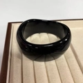 Polished black resin wide bangle with unique wavy irregular edge design for women - Black