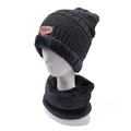 Detailed view of dark grey knitted hat and neck gaiter with thick fleece lining and patch - 2-Piece Set / Dark Gray