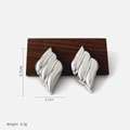 Geometrische gewellte Metallohrringe in Silber mit glänzendem Finish und schickem Design - Silber Klee Raute