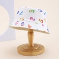 White cotton kids bucket hat with colorful cartoon number prints on wooden display - Kids One Size / White (Cartoon Numbers)